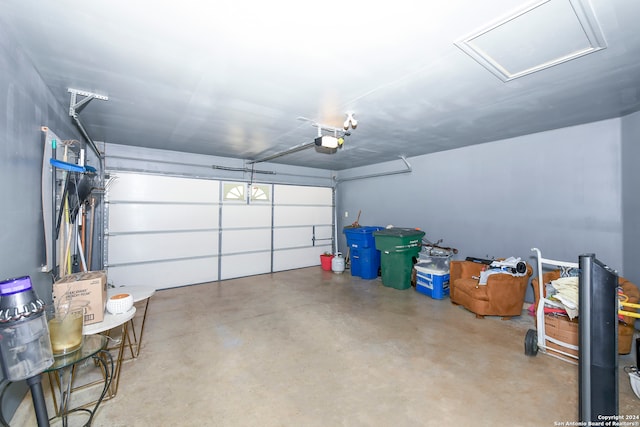 garage featuring a garage door opener