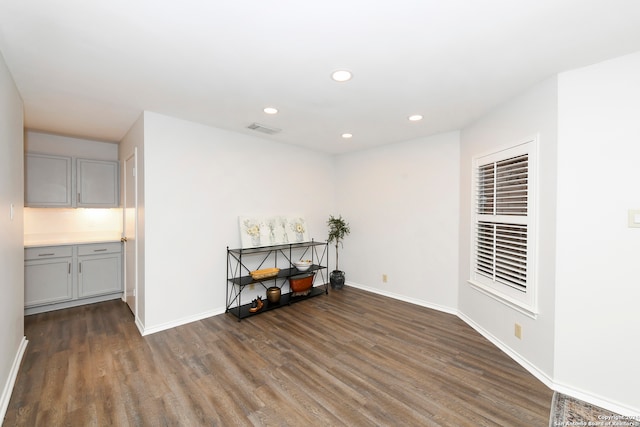 empty room featuring dark hardwood / wood-style floors