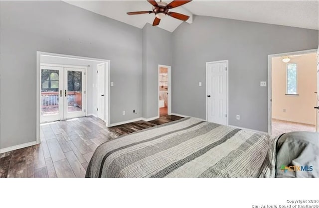 bedroom featuring french doors, access to outside, multiple windows, and hardwood / wood-style flooring