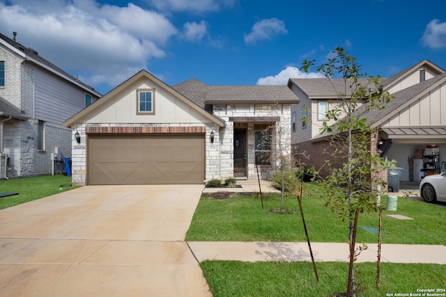 2026 Flametree Ave, New Braunfels, TX 78132 - view of front of property featuring a garage and a front yard