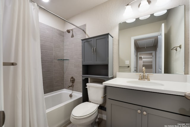 full bathroom featuring vanity, shower / bath combo, and toilet