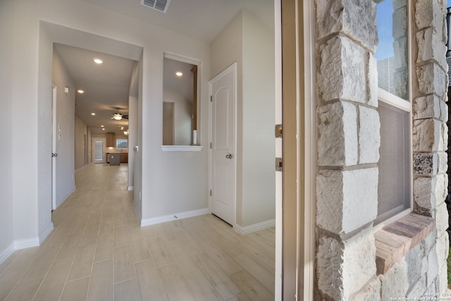 corridor featuring light wood-type flooring