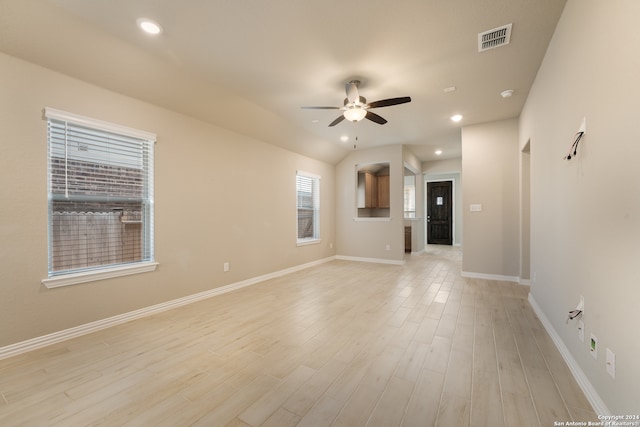 unfurnished living room with light hardwood / wood-style floors and ceiling fan