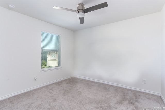 3254 Old Almonte Dr, San Antonio, TX 78224 - carpeted spare room with baseboards, ceiling fan, and a smoke detector