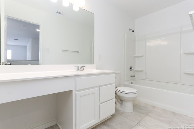 full bathroom featuring tile patterned flooring, shower / tub combination, vanity, and toilet