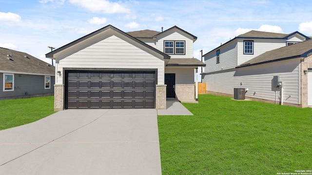 2087 Olivia Dr, New Braunfels, TX 78130 - view of front of house with driveway, a garage, a front lawn, brick siding, and central air condition unit