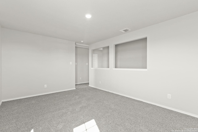 2087 Olivia Dr, New Braunfels, TX 78130 - spare room featuring baseboards, carpet, and recessed lighting