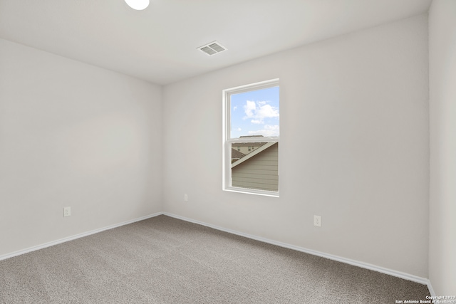 view of carpeted spare room