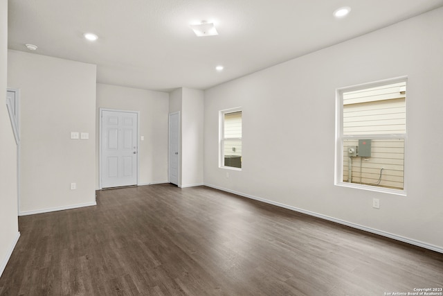 empty room featuring dark hardwood / wood-style floors