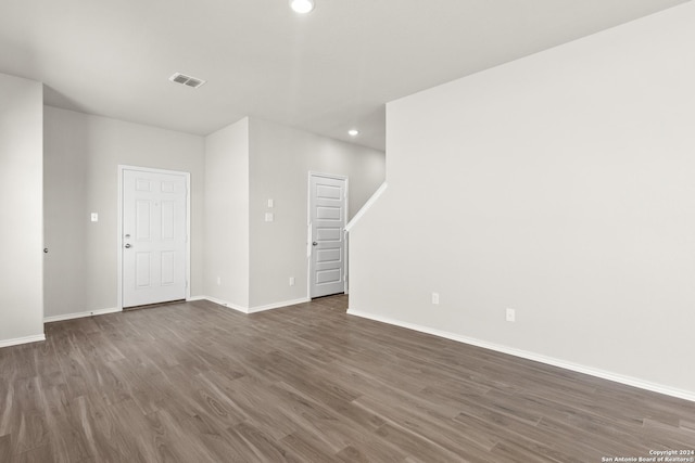 2087 Olivia Dr, New Braunfels, TX 78130 - spare room with recessed lighting, dark wood finished floors, and baseboards