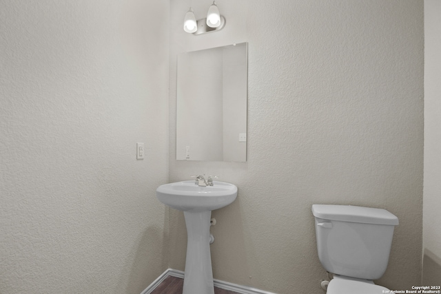 bathroom featuring toilet