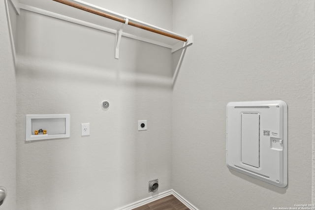 2087 Olivia Dr, New Braunfels, TX 78130 - washroom featuring electric dryer hookup, hookup for a washing machine, gas dryer hookup, baseboards, and dark wood-style floors