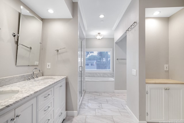 bathroom featuring vanity, independent shower and bath, and ornamental molding