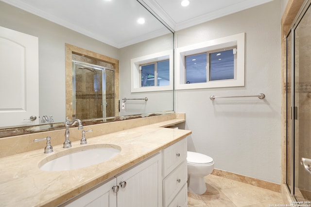 bathroom with vanity, tile patterned floors, toilet, ornamental molding, and a shower with shower door