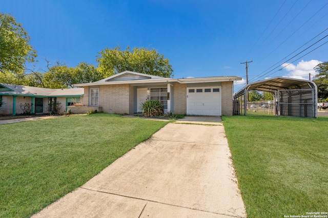 ranch-style home featuring a carport, a garage, and a front yard