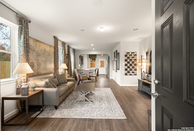 living room with dark wood-type flooring