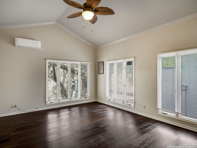 spare room featuring lofted ceiling, ceiling fan, ornamental molding, dark hardwood / wood-style flooring, and a wall unit AC