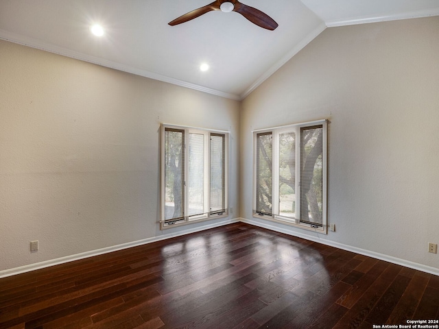 empty room with lofted ceiling, crown molding, ceiling fan, and dark wood-type flooring