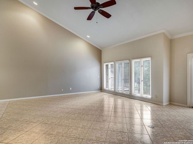 spare room featuring ceiling fan, high vaulted ceiling, and ornamental molding