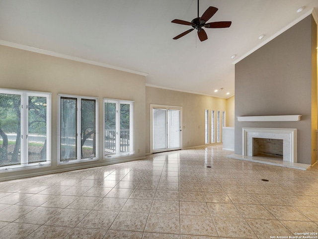 unfurnished living room featuring high vaulted ceiling, crown molding, ceiling fan, a premium fireplace, and light tile patterned flooring