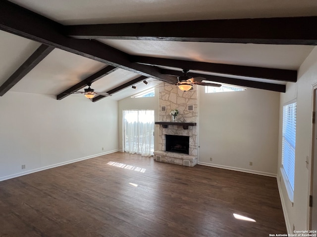 unfurnished living room with dark wood-type flooring and a healthy amount of sunlight