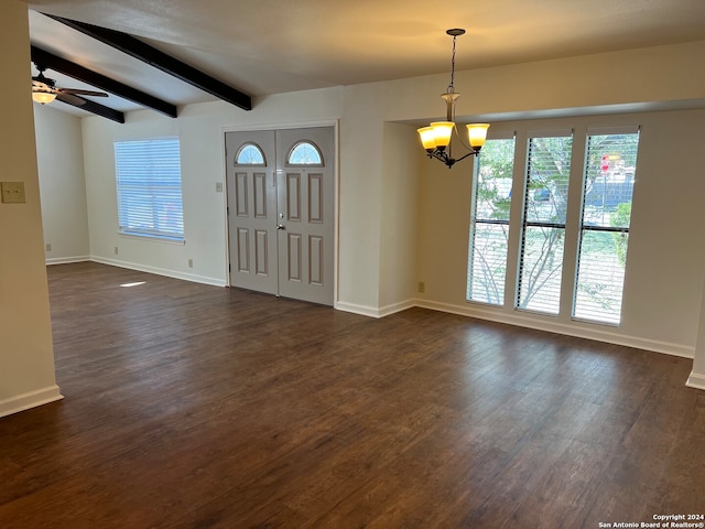 foyer featuring vaulted ceiling with beams, plenty of natural light, and dark hardwood / wood-style flooring