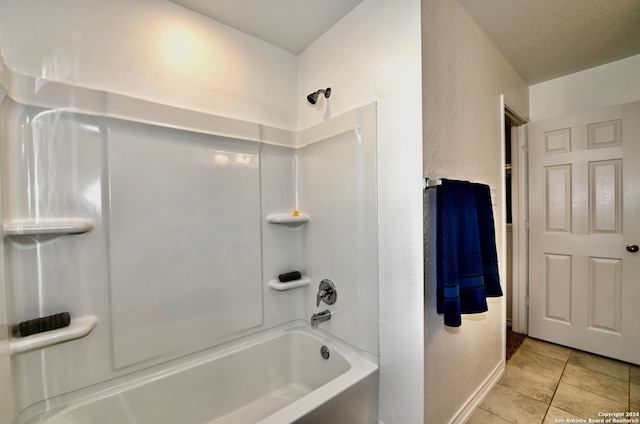 bathroom with tile patterned floors and bathing tub / shower combination