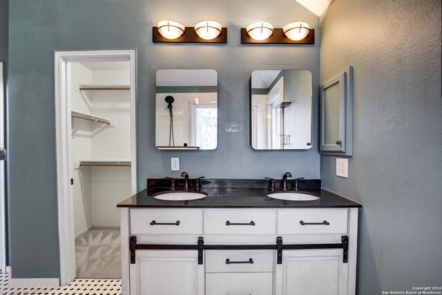268 Fawn Rdg, Cibolo, TX 78108 - full bathroom with double vanity and a spacious closet