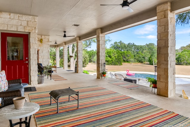 view of patio with ceiling fan