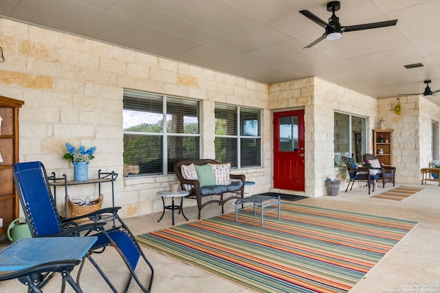 view of patio with ceiling fan