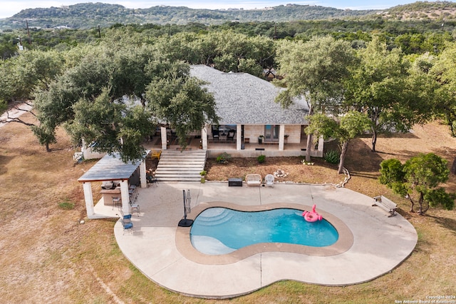 view of pool with a patio area