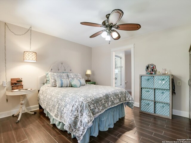 bedroom with ceiling fan and dark wood-type flooring