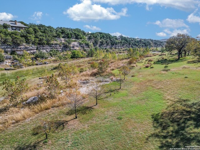 property view of mountains featuring a rural view