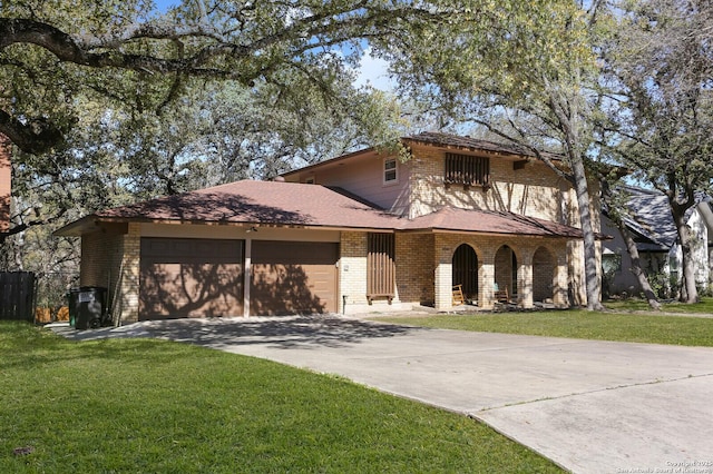 view of front of property featuring driveway, roof with shingles, a front lawn, a garage, and brick siding