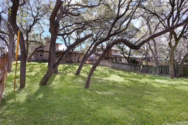 view of yard with fence