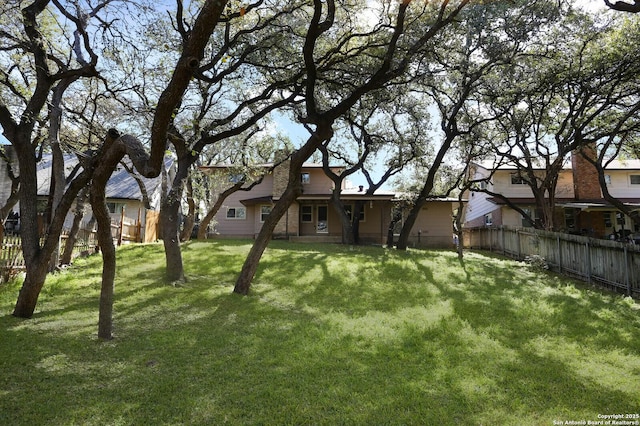 view of yard featuring fence