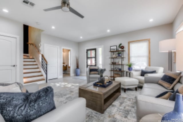 living room featuring ceiling fan