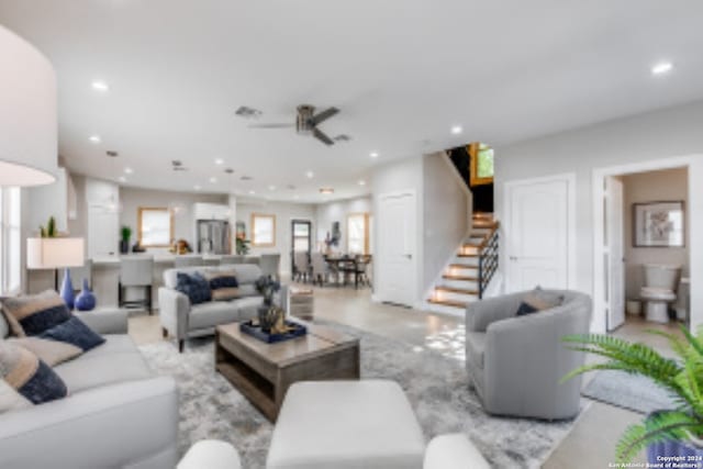 living room with ceiling fan