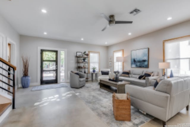 living room featuring ceiling fan