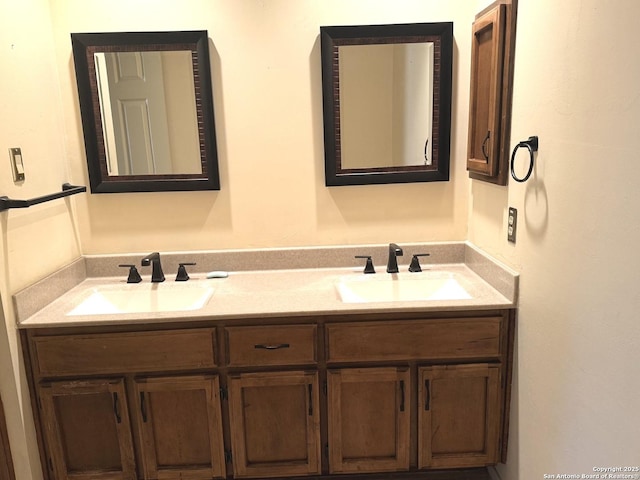 bathroom featuring double vanity and a sink