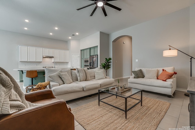 12303 Tower Frst, San Antonio, TX 78253 - living area with arched walkways, a ceiling fan, recessed lighting, and light tile patterned flooring
