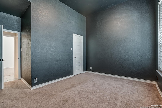 12303 Tower Frst, San Antonio, TX 78253 - spare room featuring carpet floors and a textured wall