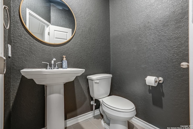 12303 Tower Frst, San Antonio, TX 78253 - half bath with toilet and tile patterned floors