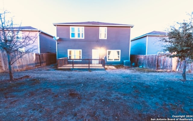 rear view of house with a deck