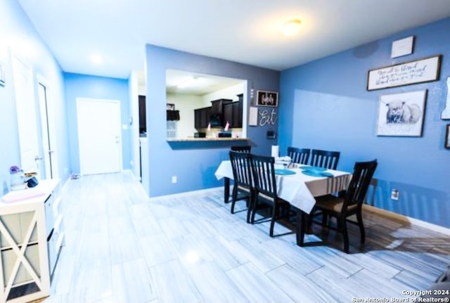 dining room featuring light hardwood / wood-style floors