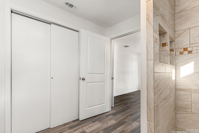 interior space with dark wood-type flooring