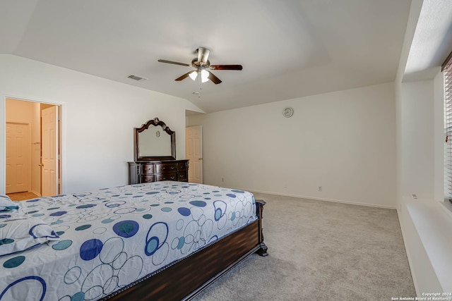 bedroom featuring light colored carpet, ceiling fan, and lofted ceiling