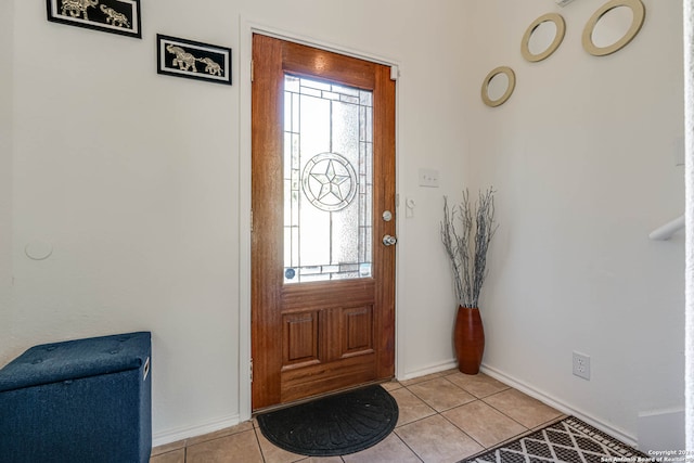 entryway featuring light tile patterned floors