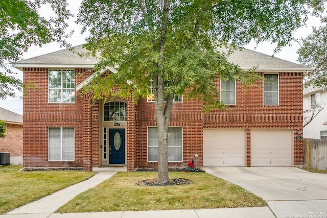 view of front of house featuring an attached garage, central air condition unit, brick siding, driveway, and a front lawn