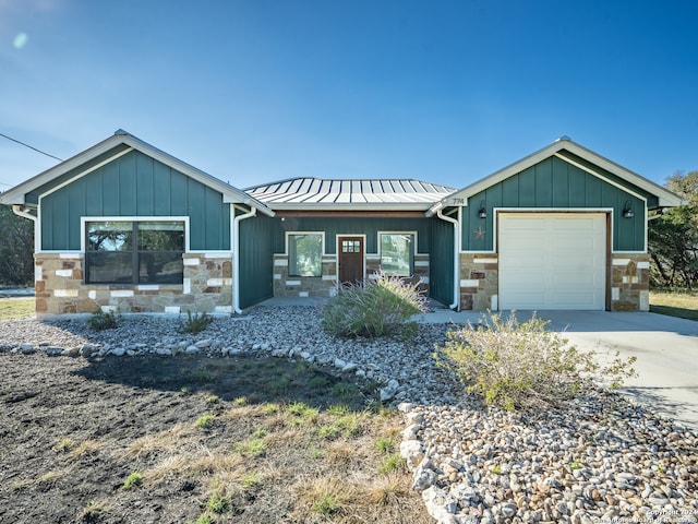 view of front of home with a garage